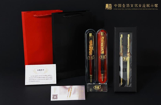 Gold leaf ballpoint pen presented in elegant gift-ready packaging
