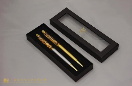 Handmade gold leaf ballpoint pen set in a sleek black case